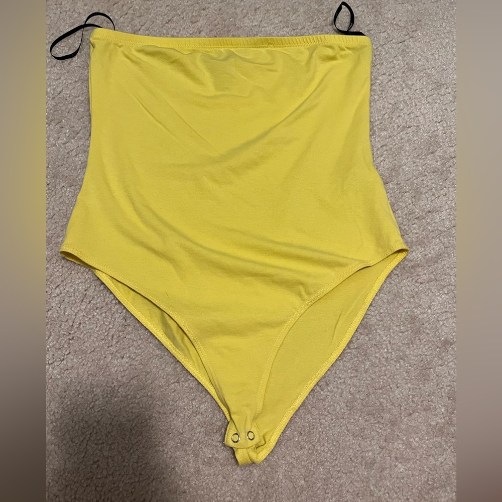 Yellow body suit